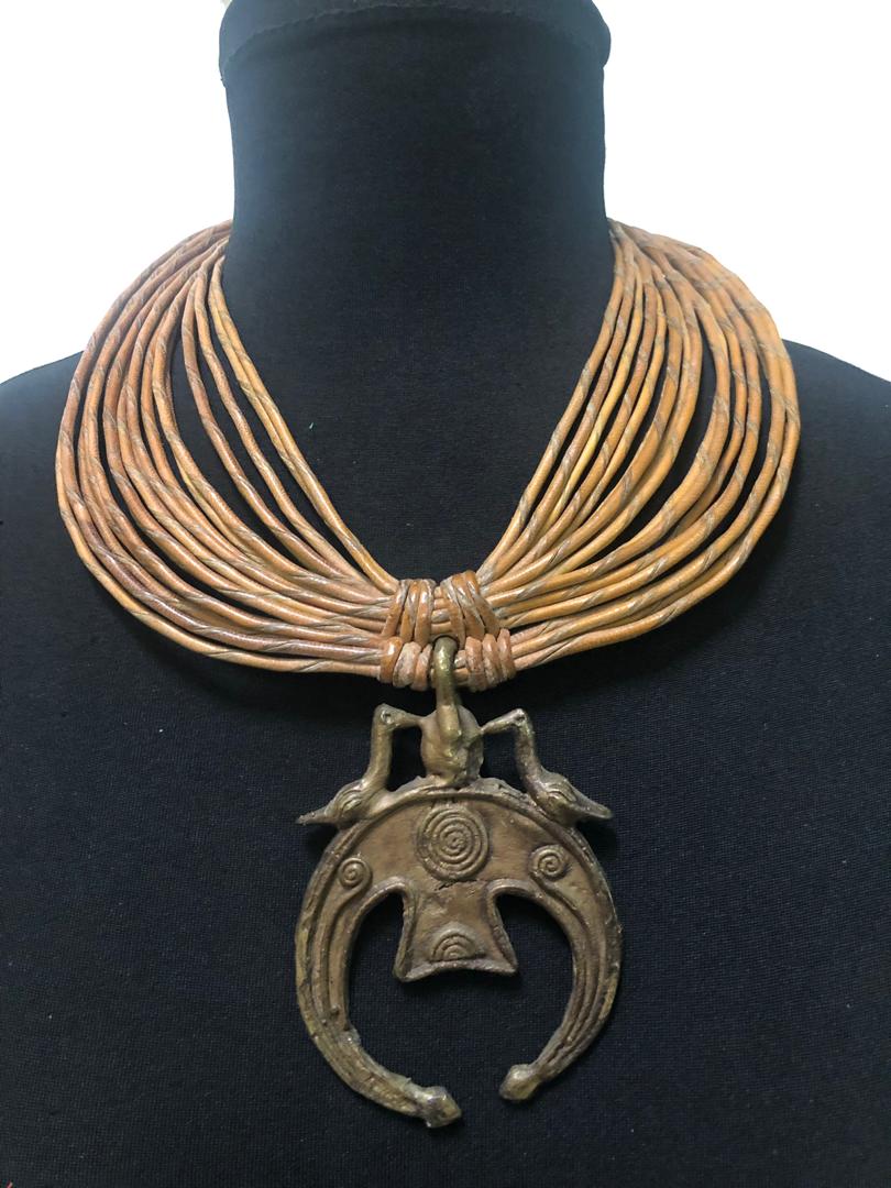 Leather-Strips-Carved-Pendant-Necklace.jpg