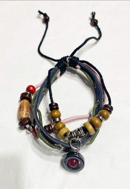 Leather Strands And Bead Bracelet