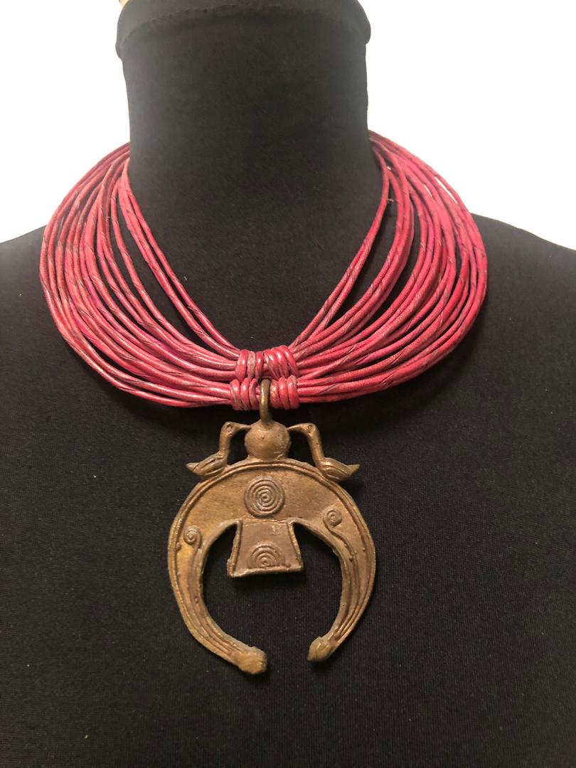 Leather-Strips-Carved-Pendant-Necklace.jpg